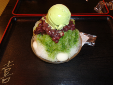 Green tea ice cream with azuki beans on shaved ice
